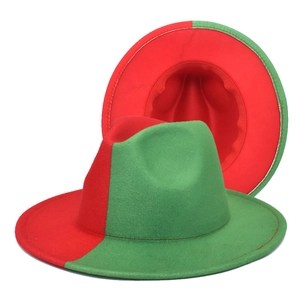 Detailed view of two-tone wool felt jazz hat featuring bold red and green gradient colors