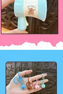 Detail of cute capybara megaphone keychain with fun voice recording function for kids