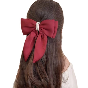 Elegant wine red satin bow hair clip with white pearl center for ponytail styling