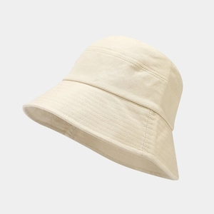 Minimalist beige cotton bucket hat with sun protection and clean stitch detail