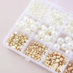 Detail of 15-compartment storage box filled with pearl and star beads for DIY jewelry making