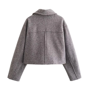 Detailed back view of a grey-purple wool jacket featuring lapel collar and premium texture