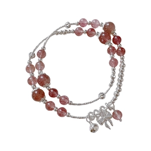 Squisito bracciale di quarzo fragola con fiocco in zircone e ciondolo a campanello bianco