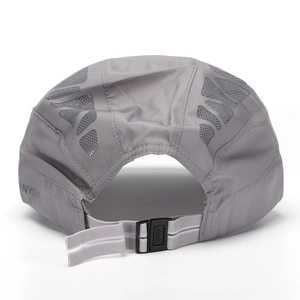 Detail of gray quick-dry sport cap featuring laser-cut vents and adjustable buckle strap