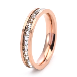 Detailed view of rose gold titanium ring with a full circle of square cubic zirconia