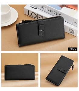 Three-way view of a black long leather wallet with gold zipper and T-shaped buckle detail