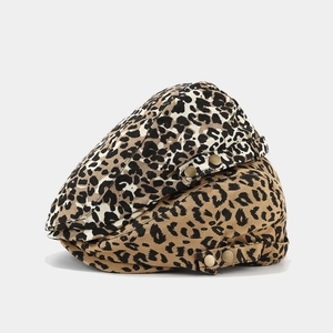 Vintage leopard print beret hats with brass buckle detail in white and khaki patterns