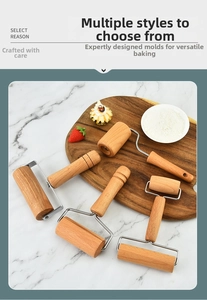 Detail of beech wood rolling pins with stainless steel brackets for baking pizza dough