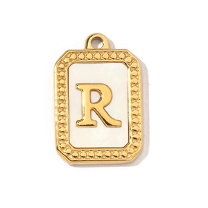 Macro view of gold stainless steel shell letter R pendant with beaded frame