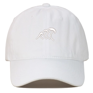 Detailed view of white embroidered wave logo on vintage washed cotton baseball cap
