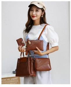 Brown woven texture 4-piece handbag set including tote and shoulder bag shown on model