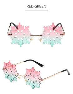 Detail of snowflake-shaped rimless sunglasses with red-green gradient lenses for parties