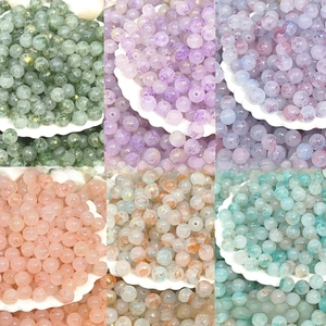 Detail of 8/10mm ink-wash glass beads in various colors for DIY jewelry making
