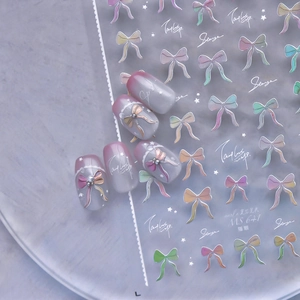 Autocollants nail art œil de chat avec nœuds dégradés roses et étoiles holographiques
