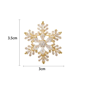 Broche flocon de neige rotative dorée avec cristaux de zircone cubique, hauteur 3,5 cm