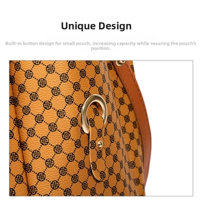 Close-up of golden ring buckle and ginger yellow leather texture with clover print