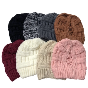 Chunky knit beanie hats with ponytail hole in multiple colors for winter warmth
