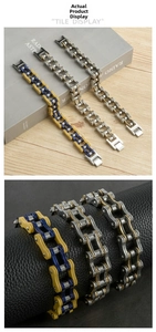 Detail of mechanical bicycle chain bracelets in tricolor, gold, and silver stainless steel
