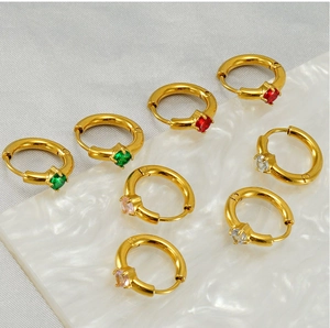 Detail of 18K gold plated stainless steel hoops with colorful round zircon stones