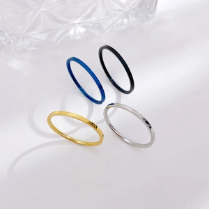 Set of four minimalist stainless steel slim rings in gold silver black and blue finish