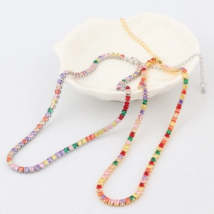 Rainbow cubic zirconia tennis necklaces in gold and silver plating on shell tray