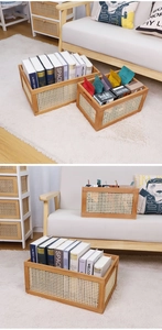 Detail view of woven storage baskets with wooden frames for organizing books and snacks