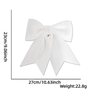 Detailed view of white glitter Christmas bow with 23cm height and 27cm width dimensions
