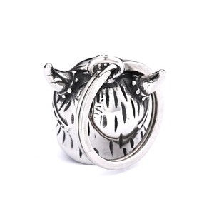 Macro shot of retro stainless steel horn skull motorcycle bell with silver antique finish