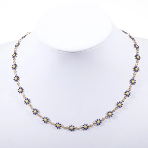 Detail of blue daisy flower pendant necklace with 18k gold plating and enamel inlay