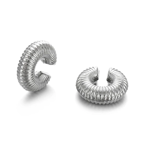 Polished silver hollow C-shaped ear cuffs with industrial textured geometric patterns