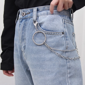 Close-up of double layer silver metal pants chain with ring on denim jeans