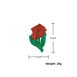 Macro view showing dimensions and weight of red rose flower hair claw clip