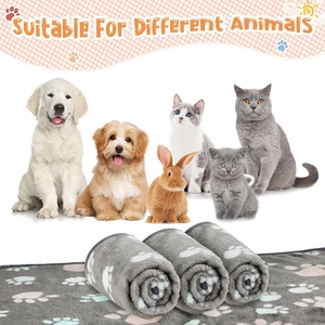 Soft flannel pet blankets with paw print patterns for dogs, cats, and small animals
