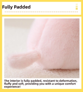 Close-up of pink plush bunny toy showing the soft fluffy texture and full stuffing
