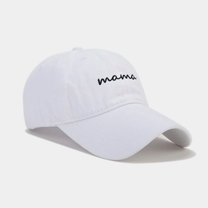 Detailed close-up of mama embroidery on a white washed cotton baseball cap for women