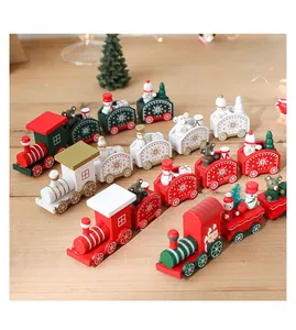 Detailed view of wooden Christmas train set with snowman and bear figures on tabletop