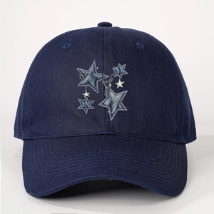 Detail of navy cotton baseball cap with metallic stars and fine chain decoration
