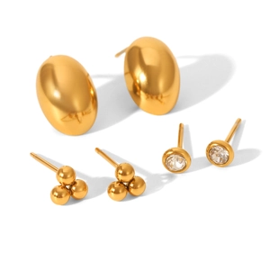 Three pairs of geometric gold earrings featuring oval, triple-ball, and cubic zirconia designs
