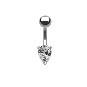 Macro shot of silver curved eyebrow piercing with a pear-cut clear heart zircon stone