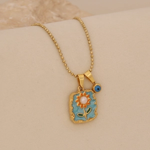 Collier tournesol doré avec pendentif en émail bleu et breloque œil sur chaîne