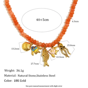 Handmade beaded necklace with 18K gold plated ocean pendants and orange natural stones