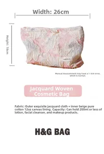 Detail view of floral jacquard makeup bag showing 26cm width and cotton canvas lining