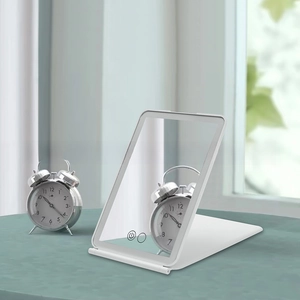 Detail showing the adjustable bracket and LED touch switch on the white folding makeup mirror