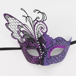 Detail of purple butterfly masquerade mask with glitter and sparkling rhinestones