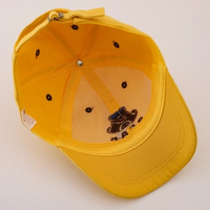 Bright yellow cotton baseball cap for kids with adjustable buckle and breathable eyelets
