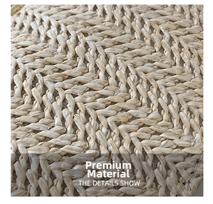 Detailed macro shot of the premium woven texture and beige raffia material on the handbag