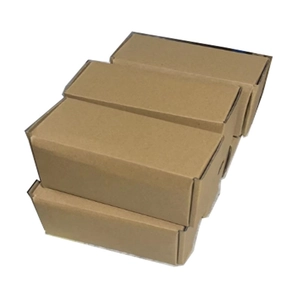 Detail view of 4 stackable brown cardboard packaging boxes for Christmas stocking hangers