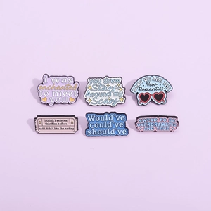 Set of 6 colorful Taylor Swift lyrics enamel pins in pink and blue on purple background