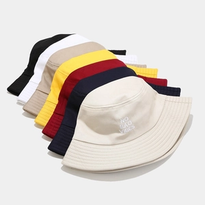 Cotton bucket hats in multiple colors featuring embroidered NO BAD VIBES lettering