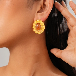 Vintage oval amber agate earrings with gold metal frame and yellow bead halo